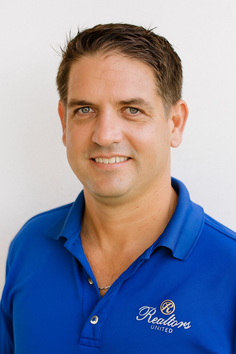 Professional headshot of Andrew Croney, Real Estate Agent with Realtors Limited Barbados